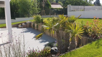 Maison jardin terrasse sur mesure exposee sud